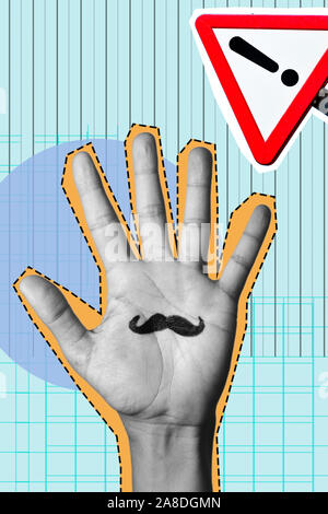 the palm of a man in black and white with a mustache painted in it, as a paper cutout, and a traffic sign with an exclamation point also as a paper cu Stock Photo