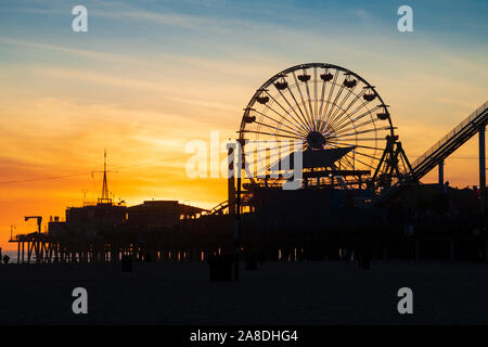 Sunset over Santa Monica pier and amusements. , Los Angeles County, California, United States of America Stock Photo