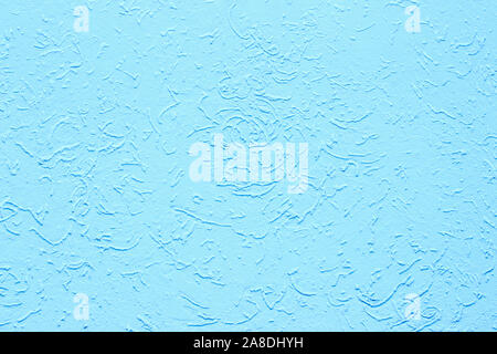Blue light stucco, wall decoration, background backdrop texture. Rough concrete wall surface with colored plaster coating. Building wall decoration Stock Photo