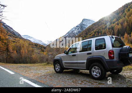A driving journey on a Jeep KJ Liberty 2002 Cherokee Sport a 4x4 Off-roader car drive in the mountains to explore and discover stunning landscapes Stock Photo