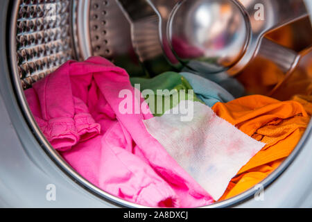 https://l450v.alamy.com/450v/2a8dxcj/color-absorbing-sheet-inside-a-washing-machine-allows-to-wash-mixed-color-clothes-without-ruining-colors-concept-2a8dxcj.jpg