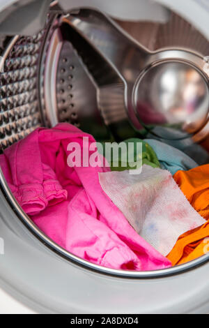 Woman Hand Put Color Absorbing Sheet Inside A Washing Machine Allows To  Wash Mixed Color Clothes Without Ruining Colors Concept Stock Photo -  Download Image Now - iStock