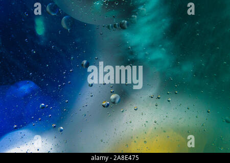 abstract background with space for text, macro photo of water and oil on glass surface Stock Photo