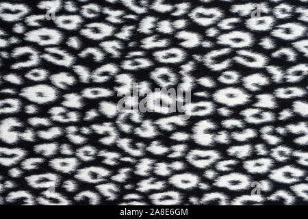 Black and white woolen leopard texture. Fashionable modern ecological material. Plaid or carpet. Stock Photo