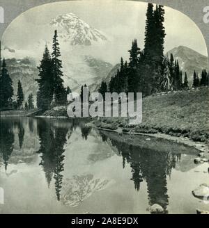 'Mt. Rainier from Mirror Lake, Indian Henry's Hunting Ground, Mt. Rainier National Park, Washington', c1930s. From &quot;Tour of the World&quot;. [Keystone View Company, Meadville, Pa., New York, Chicago, London] Stock Photo