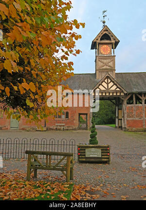19th Century timber framed Clock Tower at Arley Hall, Arley Village, Warrington, Cheshire, England, UK, in autumn Stock Photo