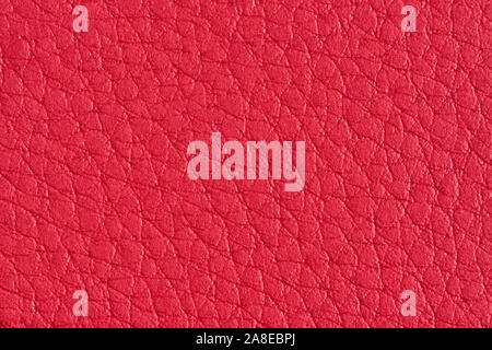 Red paper with leather texture for background. Paper for interior and exterior decoration or background for handcrafts. Red paper background. Stock Photo
