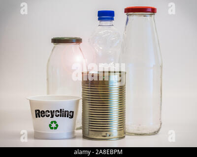 Arrangement of Recyclable Packaging made from Different Materials such as Glass, Metal and PET Stock Photo