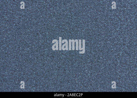 Blue paper with abstract texture for background. Paper for interior and exterior decoration or background for handcrafts. Blue paper background. Stock Photo