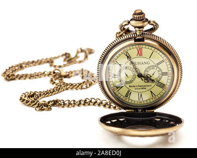 Modern ornate pocket watch and chain. Stock Photo