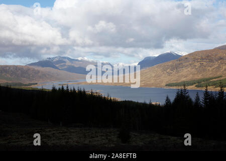 View up Loch Loyne to the mountains of Glenquoich Forest and Cluanie Forest, North West Highlands, Scotland, UK Stock Photo