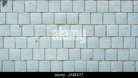 Blue tiles on a wall as a background image. Stock Photo