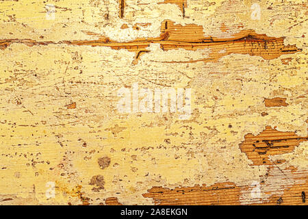 Old natural wooden shabby pastel yellow background, close up. Copy space, flat lay, top view. Stock Photo