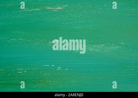 Background of a painted grungy green concrete wall Stock Photo