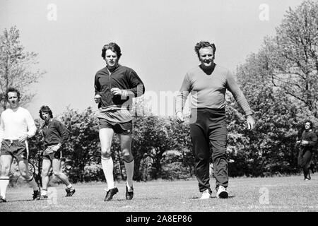 England team manager Don Revie in training with his players at Manchester University sports ground, Wythensaw, where they were preparing for the match against Northern Ireland in Belfast - the first of the Home International Championship. Stock Photo