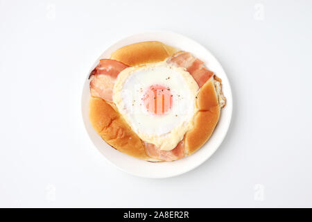 bacon egg bread on plate isolated on white background Stock Photo