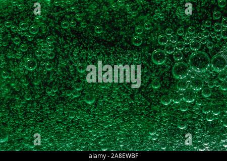 green abstract background with air bubbles in soap Stock Photo