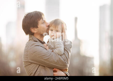 Young girl and child in a park Stock Photo