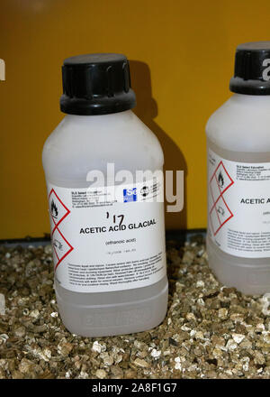 Stock bottle of glacial acetic acid in a chemical store in the UK Stock Photo