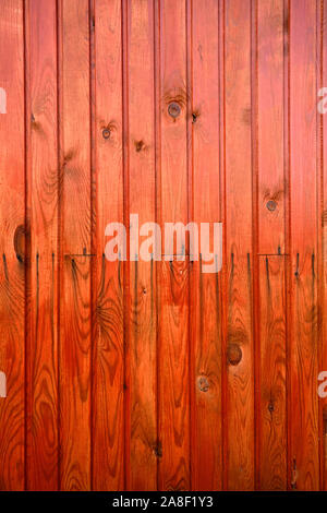 Background of wooden boards painted with red marilka. Stock Photo