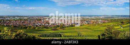 Germany, XXL panorama aerial view above skyline, roofs, houses, tower and vineyard of city fellbach near stuttgart in autumn season on sunny day Stock Photo