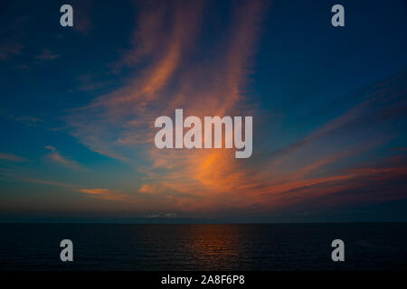 Sunset on the sea. red clouds Stock Photo
