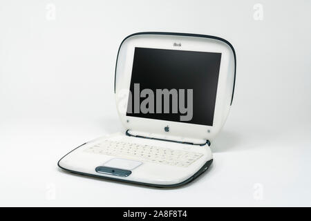 Los Angeles, California, USA - November 6, 2019:  Illustrative editorial photo of old Apple clamshell style iBook laptop computer. Stock Photo