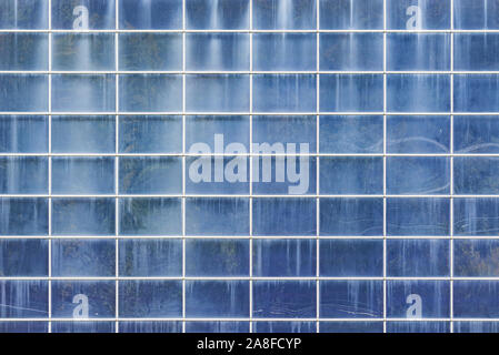 Fragment of the wall made from glass and metal. Stock Photo