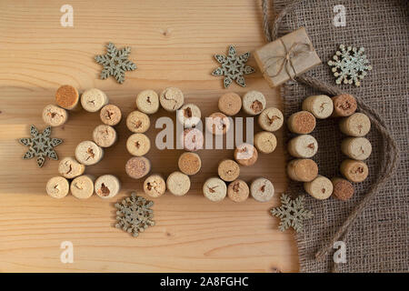 Wine corks stacked as the date of the 2020 retro style. Christmas background Stock Photo