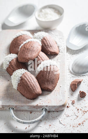 Sweet Madeleine chocolate cookies as a small french snack Stock Photo