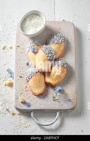 Homemade Madeleine cookies baked in a fluted tin or mould Stock Photo
