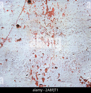 Grunge texture . Red stains , scratches and dots on white background . Wall surface . Stock Photo