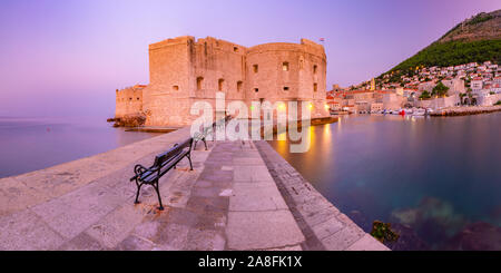 Panoramic view of The Old Harbour and Fort St Ivana at sunrise in Dubrovnik, Croatia Stock Photo