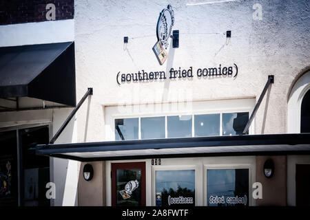 Entrance to A trendy boutique comic book store southern fried