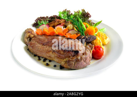 Beef steak with black peppers decorate fresh rosemary, asparagus grilled oyster mushroom and radish salad carved vegetables style side view Stock Photo