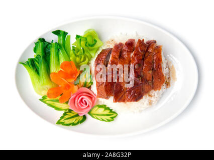 Roasted duck on rice fusion food Chinese style decorate with carved vegetables the best top ten popular of Chinese and Thailand top view Stock Photo