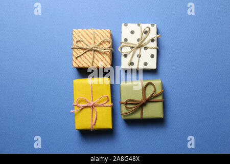 Gift boxes on blue background. Christmas or birthday concept Stock Photo