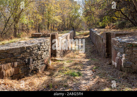 Old stone canal locks on the Patowmack canal bypassing Great Falls on the Potomac river Stock Photo