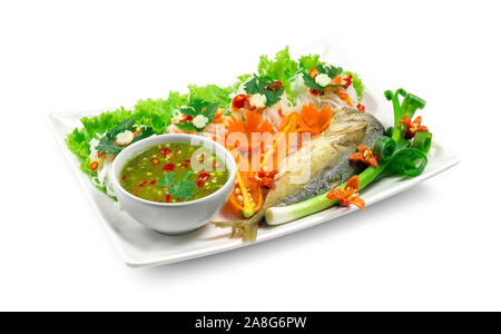 Fried mackerel (Maing-PLA-too) and fresh vegetables serving with Thai rice small noodles and seafood sauce deepping Thai appetizer salad Thai style si Stock Photo