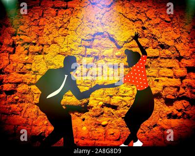 Silhouette Couple dance, on wall background & light reflection Stock Photo