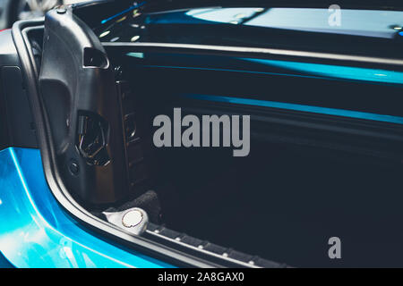 Opened empty blue car trunk Stock Photo