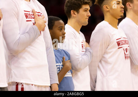 Madison, WI, USA. 8th Nov, 2019. Howard Moore's son stood with the Badgers team before the NCAA basketball game between the Eastern Illinois Panthers and the Wisconsin Badgers at the Kohl Center in Madison, WI. John Fisher/CSM/Alamy Live News Stock Photo