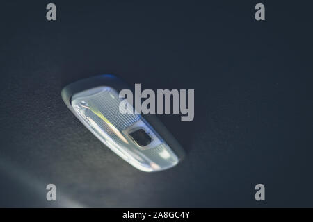 Car ceiling lamp and switch turn on-off in car Stock Photo