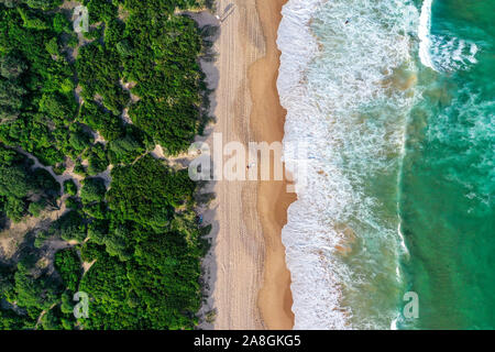 Beach aerial view from drone beach shadow people sunrise Stock Photo