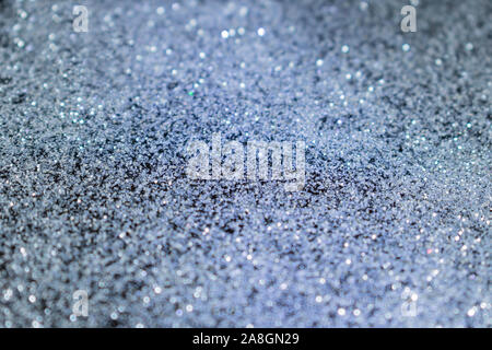 silver shiny background of small sparkles. Stock Photo