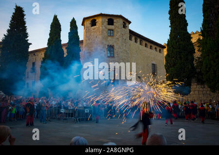 Saint John's Night Celebration 23 June 2019 - The Catalan Festival of Fire. Revetlla de Sant Joan -  Correfoc - fire running -  Placa Octavia, Sant Cu Stock Photo