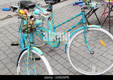 two blue old bicycles in the city Stock Photo