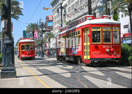 Streetcars on Canal Street in New Orleans. The historic French Quarter is a major tourist attraction. Stock Photo