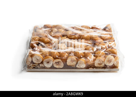 Pack  of Italian hazelnut brittle isolated on white Stock Photo