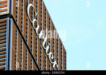 The Boutique Cartier Tokyo Ginza building detail. The Cartier logo near the top of the exterior lattice facade wall. Stock Photo